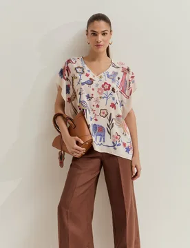 Blusa poncho de mujer con estampado - Lion of Porches - FashionsVida