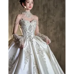 A new high-end custom-made satin strapless dress with luxurious