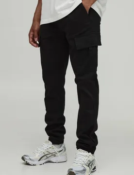 Herren Schmale Cargo-Hose mit elastischem Bund und Bündchen Black Größe Small - boohooMAN - FashionsVida