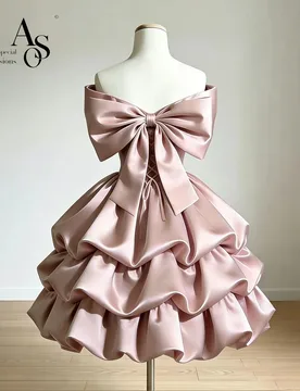An elegant satin strapless bonito knee-length evening gown with a voluminous tiered skirt and a bow at the back - Aliexpress - FashionsVida