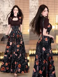A new style of fashionable lace-up waist-cinching and cut-out stand-up collar dress with two-piece patchwork print
