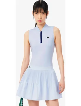 Polo de mujer de tenis elástico sin mangas ultra-dry en blanco - Lacoste - FashionsVida