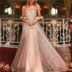 New strappy sleeveless tulle dress with gold accents