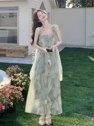 A new vacation-style lace halter dress with of elegance and atmosphere