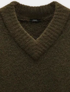Jersey de mujer largo de punto con cuello pico - Parfois - FashionsVida