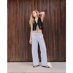 Pantalón gomas de mujer con tachas