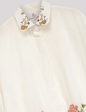Blusa de mujer larga con bordado floral y bajo asimétrico - Niza - FashionsVida