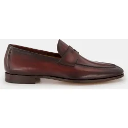 Mocasines de hombre en piel con adorno de antifaz y suela de goma
