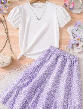 Conjunto de 2 piezas de moda para niña preadolescente - Top de manga corta y cuello redondo de unicolor + Falda asimétrica con estampado floral, rop - Shein - FashionsVida