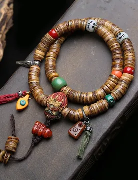 Tibetan-style 108-bead prayer beads made from camel bone, featuring a Black Dharma King design with yak bone and cloud-patterned - Aliexpress - FashionsVida