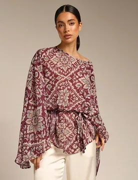 Blusa suelta de manga de murciélago con estampado elegante para mujer, versátil para ir al trabajo, la oficina, salidas, citas de primavera, uso dia - Shein - FashionsVida