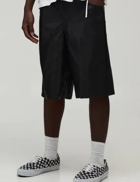 Herren Locker Geschnittene Gewaschene PU-Shorts In Verlängerter Form Black Größe 30 - boohooMAN - FashionsVida