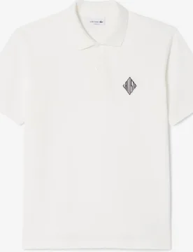 Polo de hombre de piqué de corte clásico con insignia en contraste en marrón de manga corta en marrón - Lacoste - FashionsVida